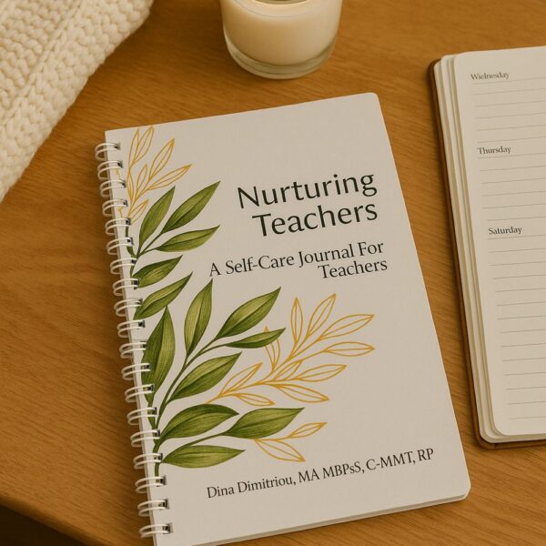 "Nurturing Teachers self-care journal on a wooden desk with a planner, candle, and cozy knit – a mental health and wellness journal designed for teachers."